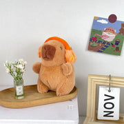 Mini Capybara Plushie – Hoodies, Headphones & Ducks