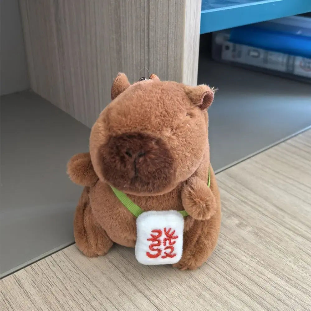 Mini Capybara Plushie – Hoodies, Headphones & Ducks