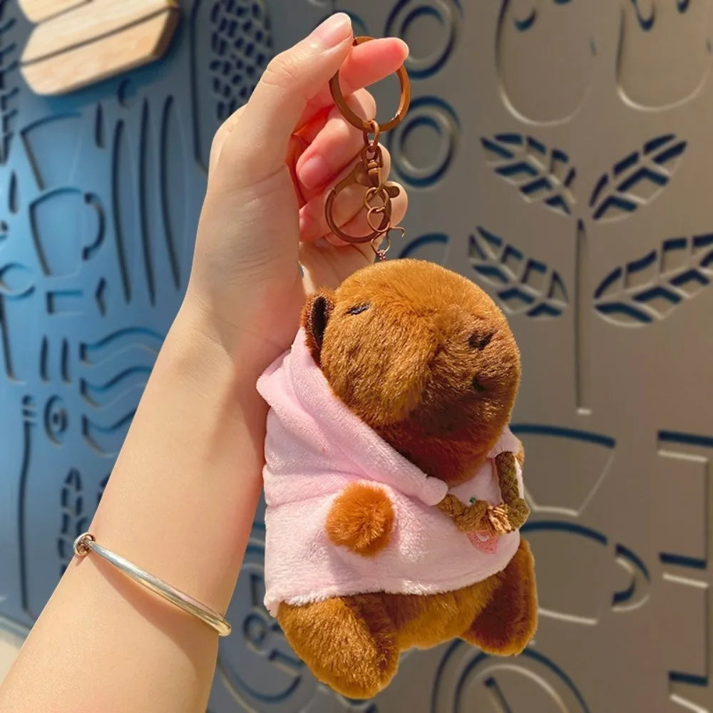 Mini Capybara Plushie – Hoodies, Headphones & Ducks
