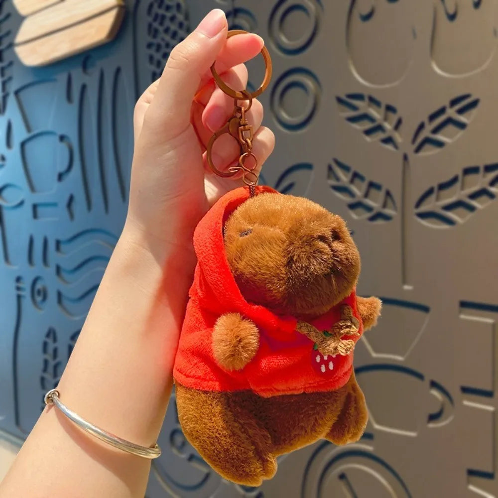 Mini Capybara Plushie – Hoodies, Headphones & Ducks